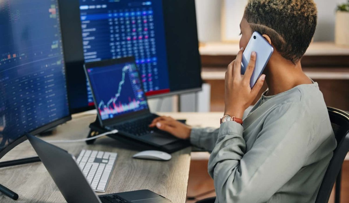 business-woman-phone-call-and-trading-on-stock-ma-2023-09-21-03-04-23-utc-min.jpg